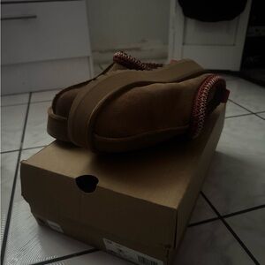 UGG Brown Slippers with Red Trim